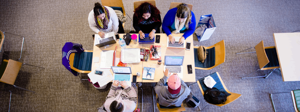 overhead view of students studying at table